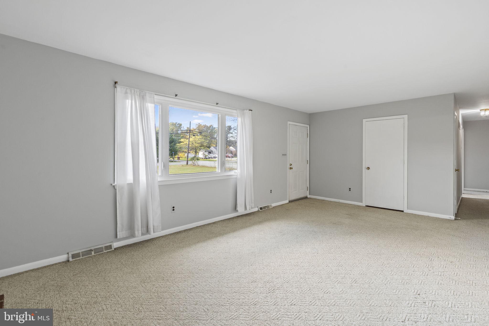 413 Magnolia Road Edgewood, MD 21040 - Photo 3 of 49 an empty room with windows