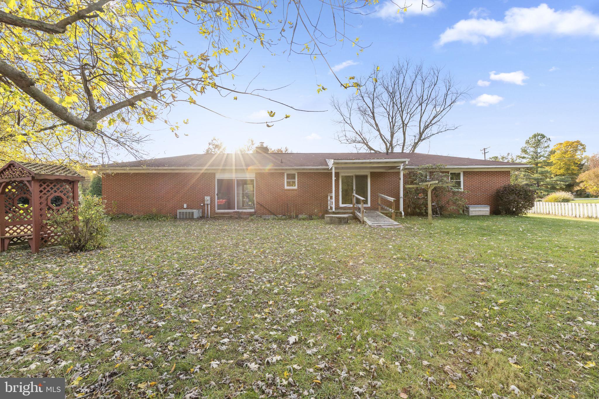 413 Magnolia Road Edgewood, MD 21040 - Photo 32 of 49 a front view of a house with garden