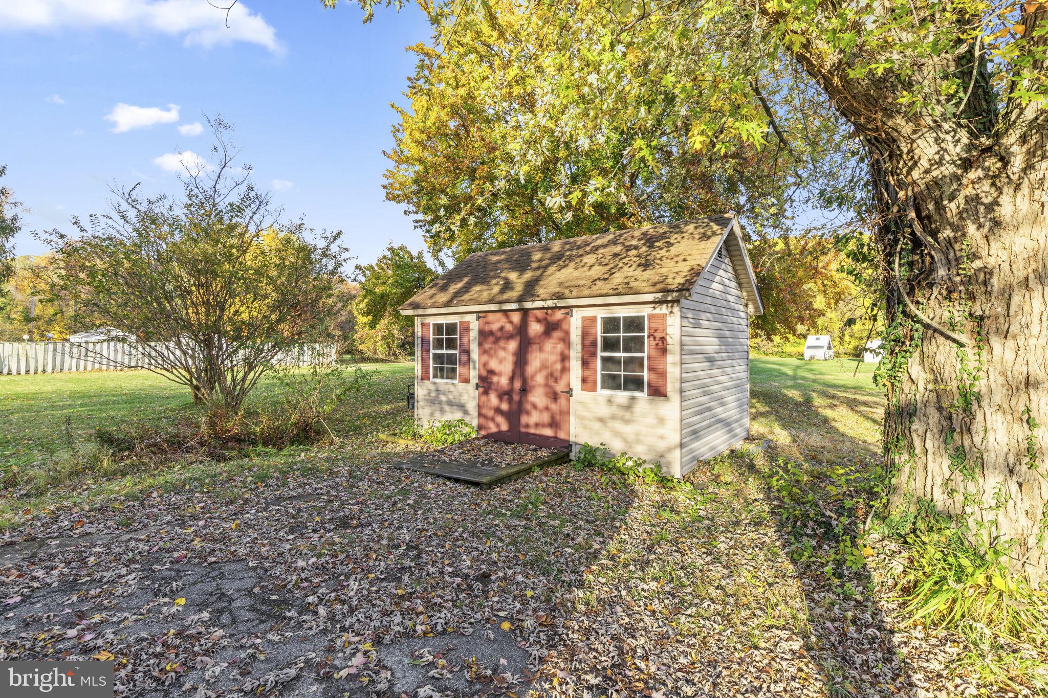 413 Magnolia Road Edgewood, MD 21040 - Photo 36 of 49 a view of a backyard with large tree