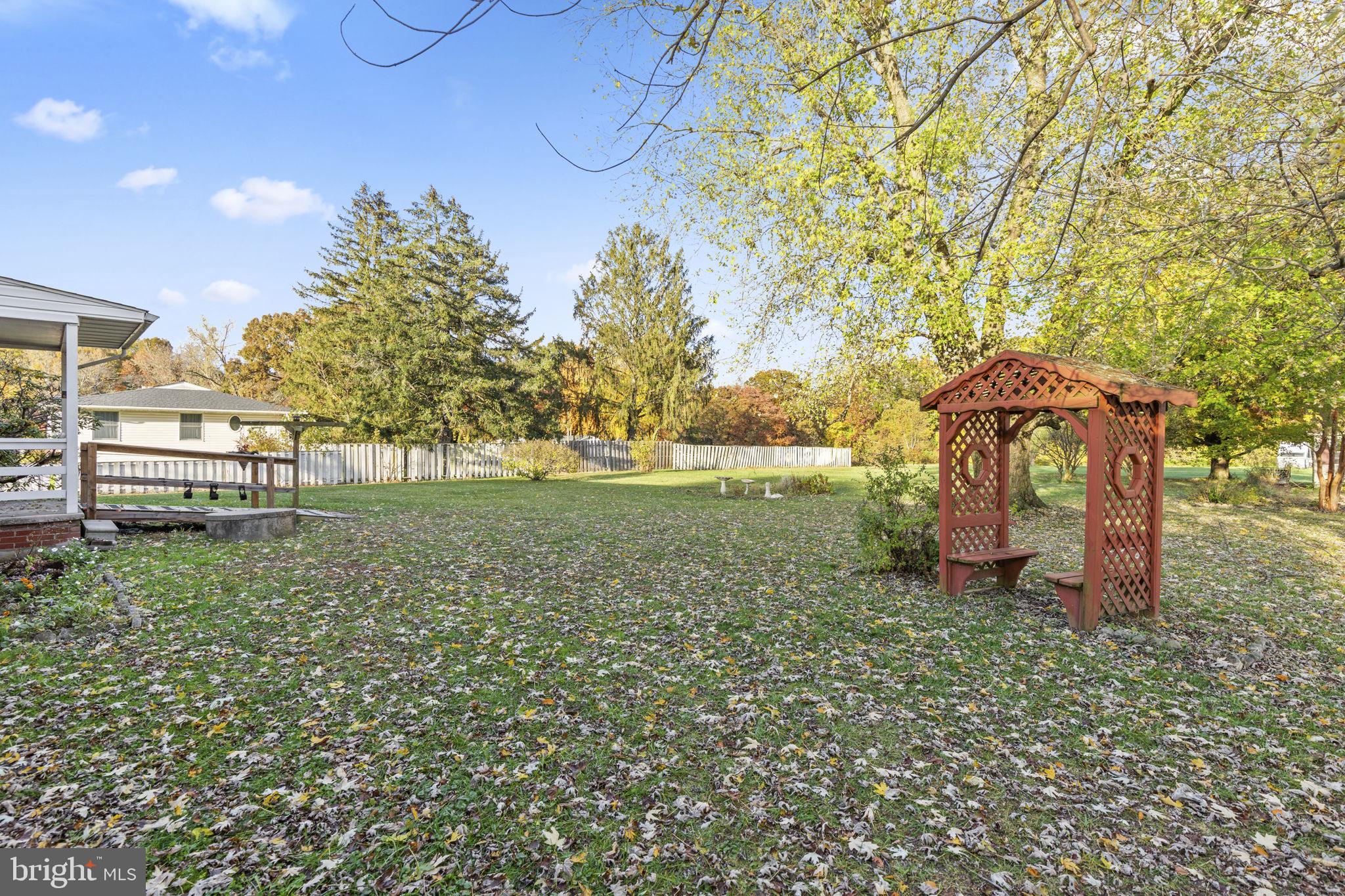 413 Magnolia Road Edgewood, MD 21040 - Photo 39 of 49 a backyard of a house with lots of green space