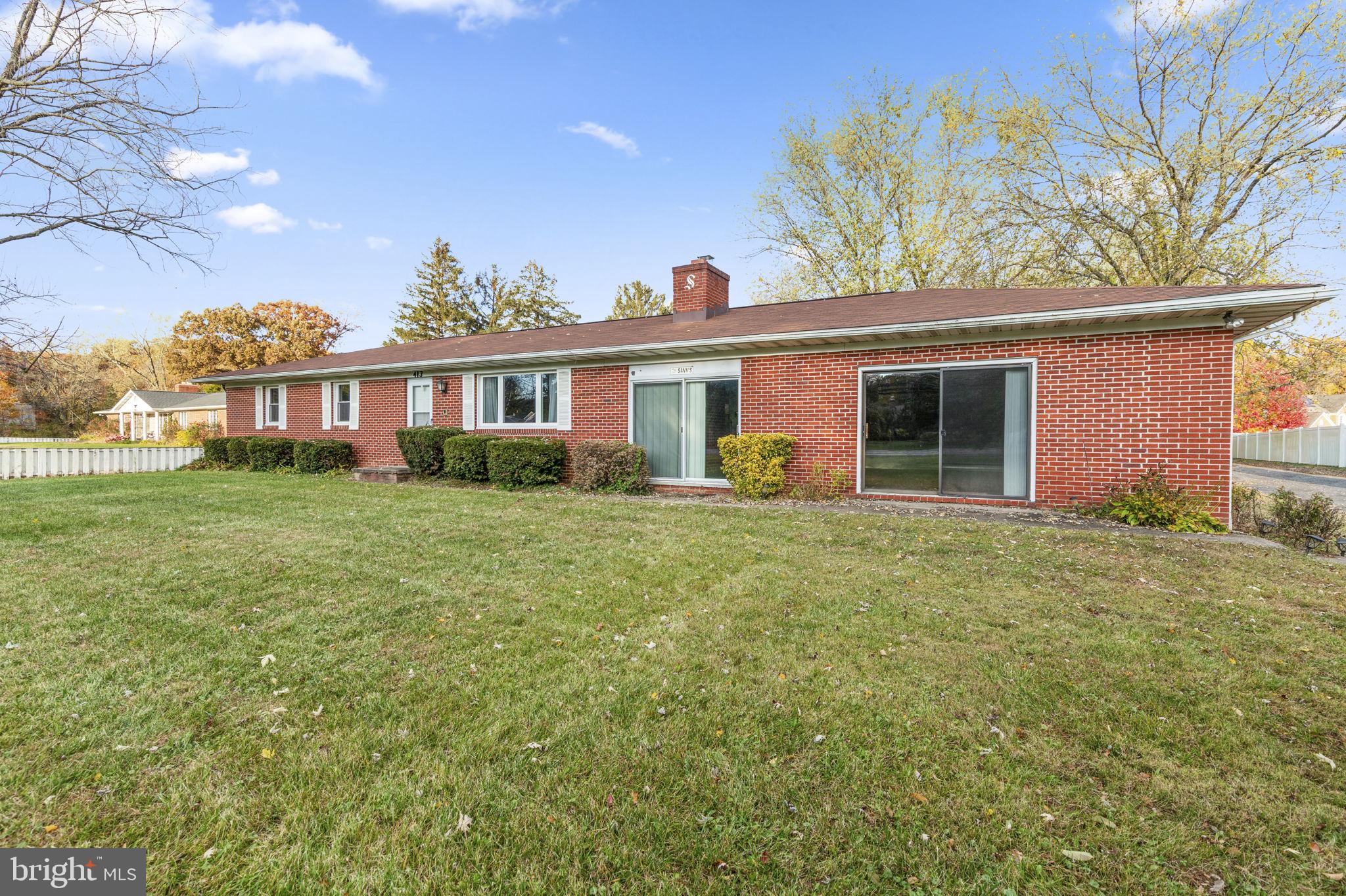 413 Magnolia Road Edgewood, MD 21040 - Photo 46 of 49 a front view of a house with garden