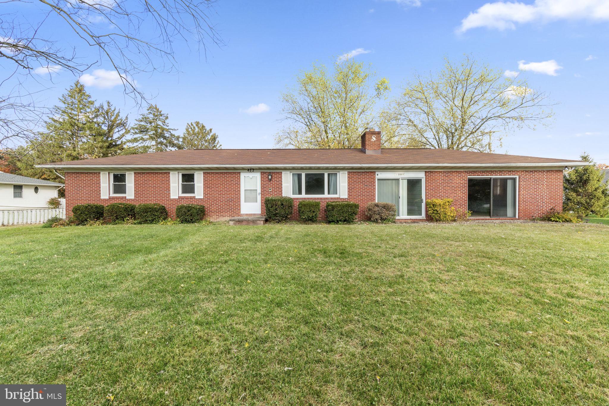 413 Magnolia Road Edgewood, MD 21040 - Photo 47 of 49 a front view of a house with a garden