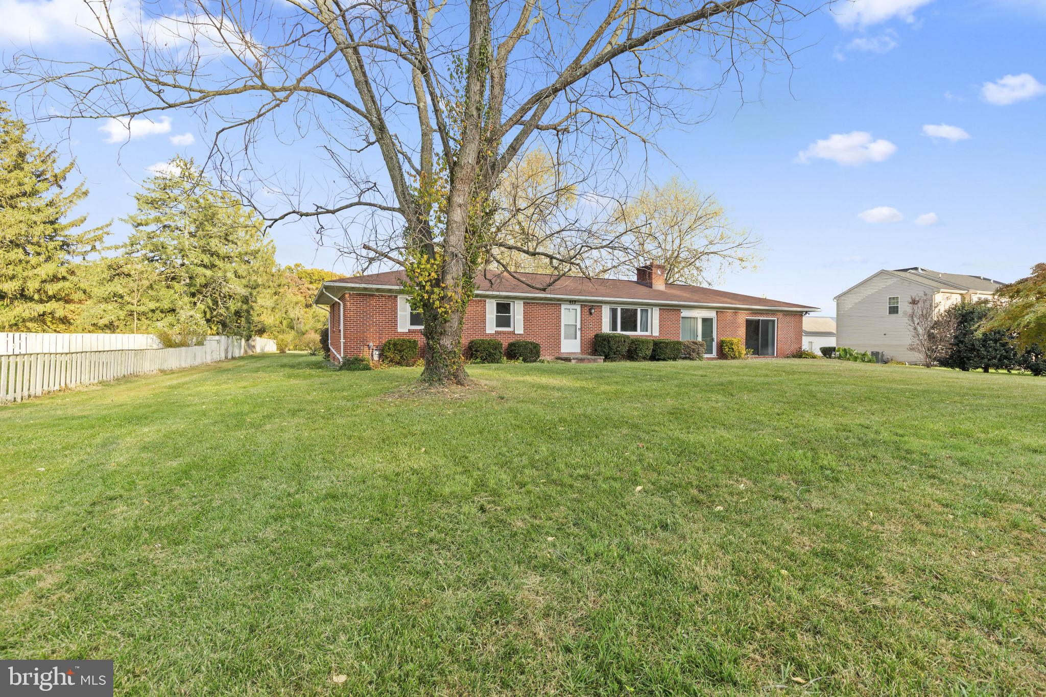 413 Magnolia Road Edgewood, MD 21040 - Photo 48 of 49 a view of a house with a big yard and large trees