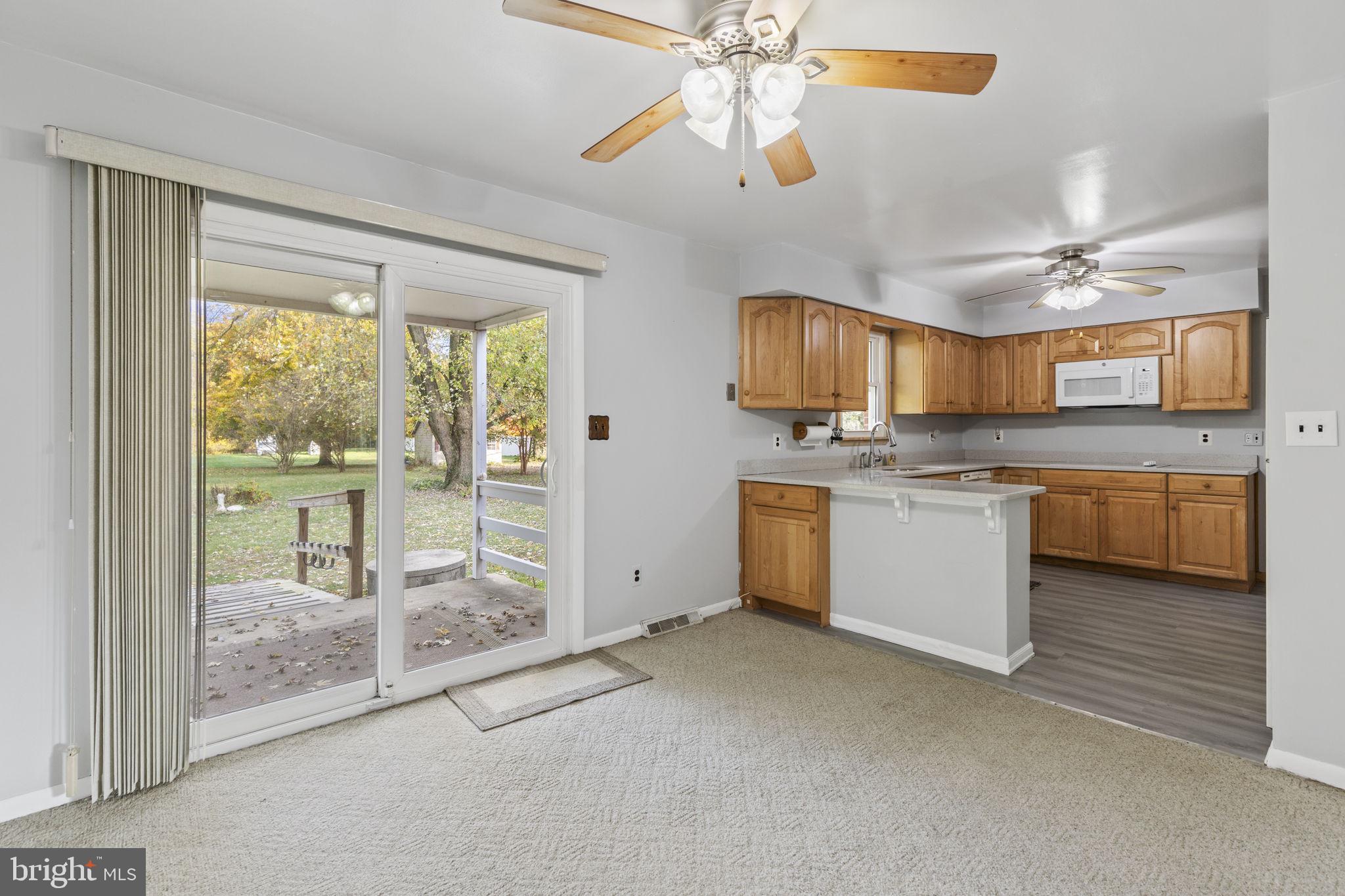 413 Magnolia Road Edgewood, MD 21040 - Photo 6 of 49 a view of a kitchen with stainless steel appliances granite countertop a stove top oven