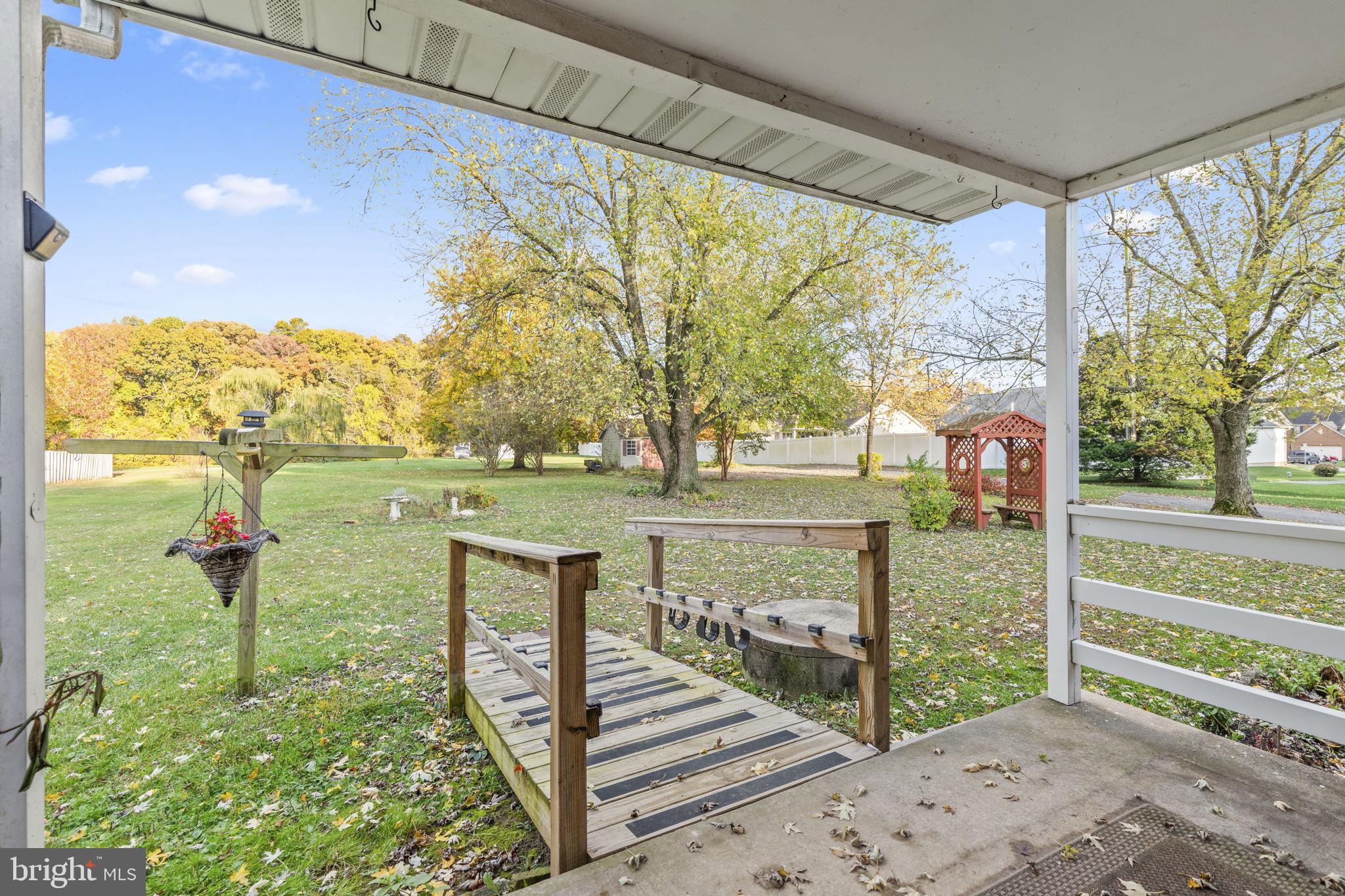 413 Magnolia Road Edgewood, MD 21040 - Photo 10 of 49 a view of a pathway with a wrought fence