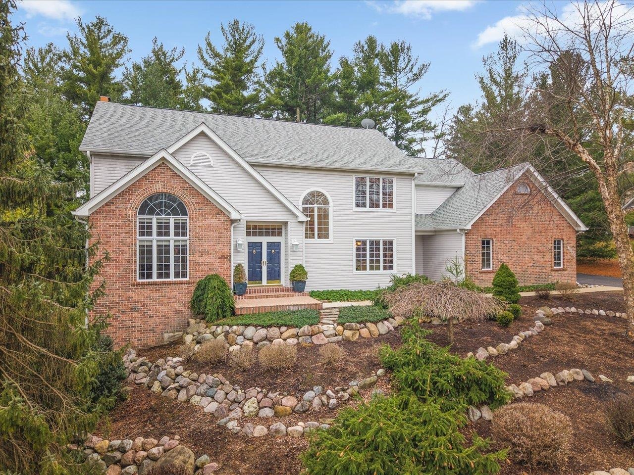11575 Aberdeen Road Belvidere, IL 61008 - Photo 1 of 46 a front view of a house with garden