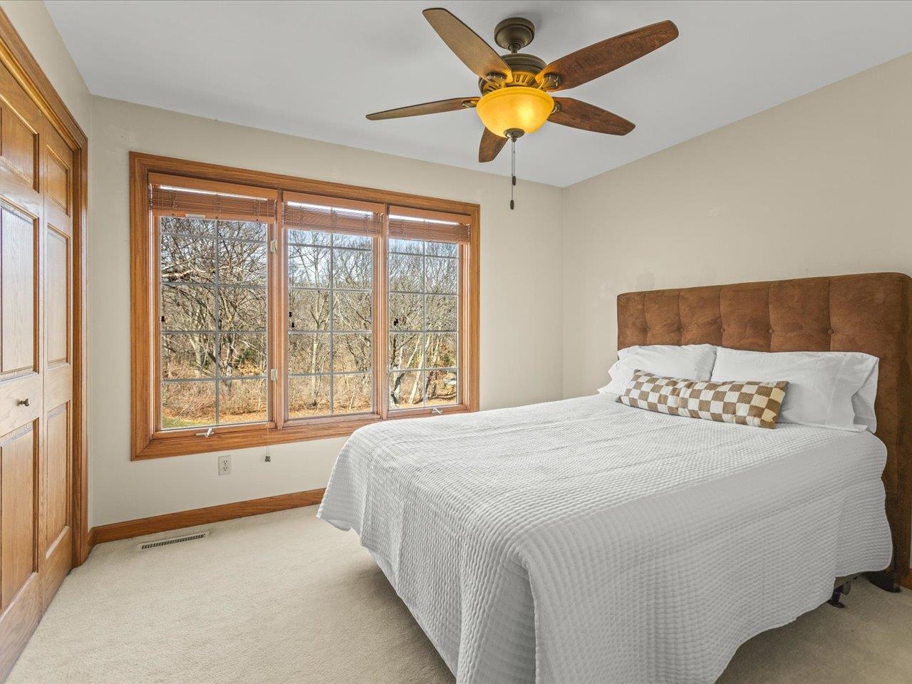11575 Aberdeen Road Belvidere, IL 61008 - Photo 31 of 46 a bedroom with a bed and a large window