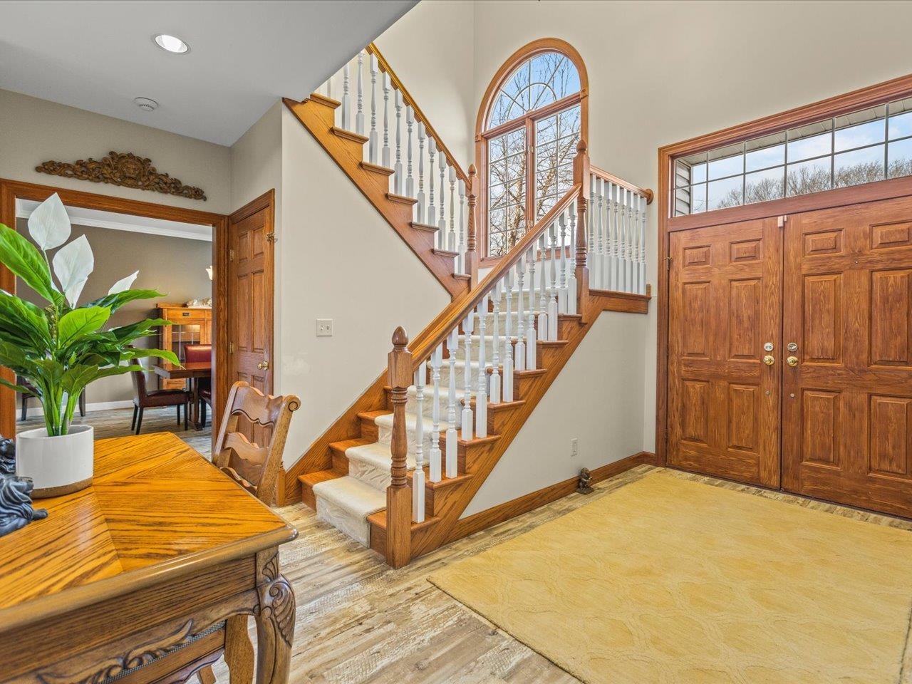 11575 Aberdeen Road Belvidere, IL 61008 - Photo 8 of 46 a view of an entryway with wooden floor and door