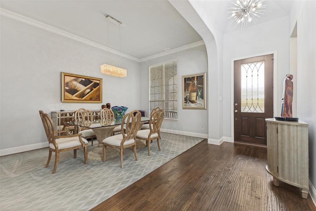 506 Life Spring Drive Rockwall, TX 75087 - Photo 4 of 36 a dining room with furniture and window