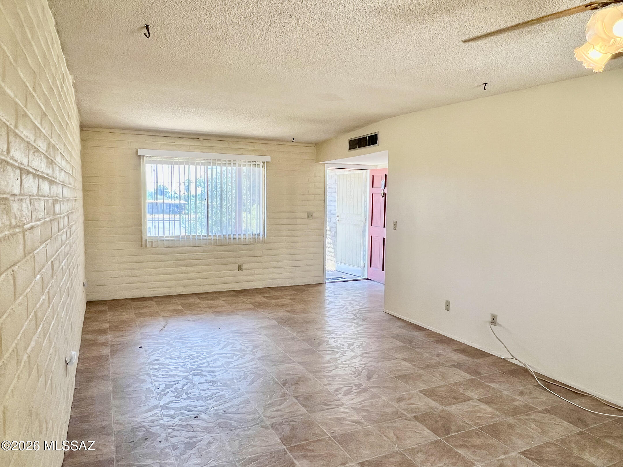 2955 South Kolb Road Tucson, AZ 85730 - Photo 5 of 24 Living Room View of Front Door and Window