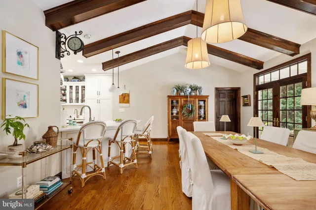 a kitchen with stainless steel appliances a refrigerator and a stove