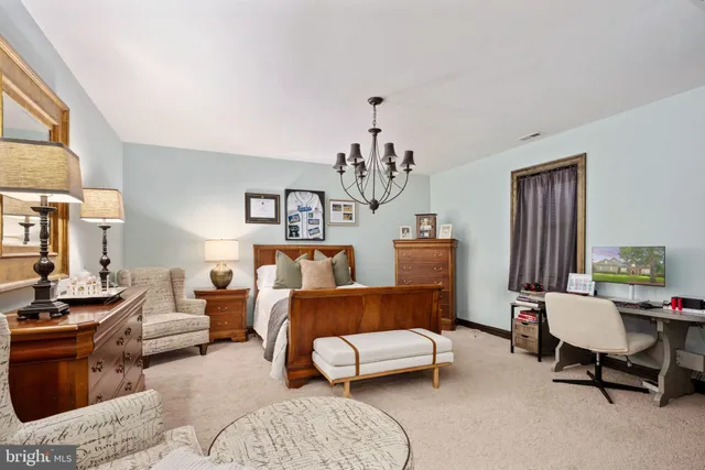 an aerial view of a house with a lake view