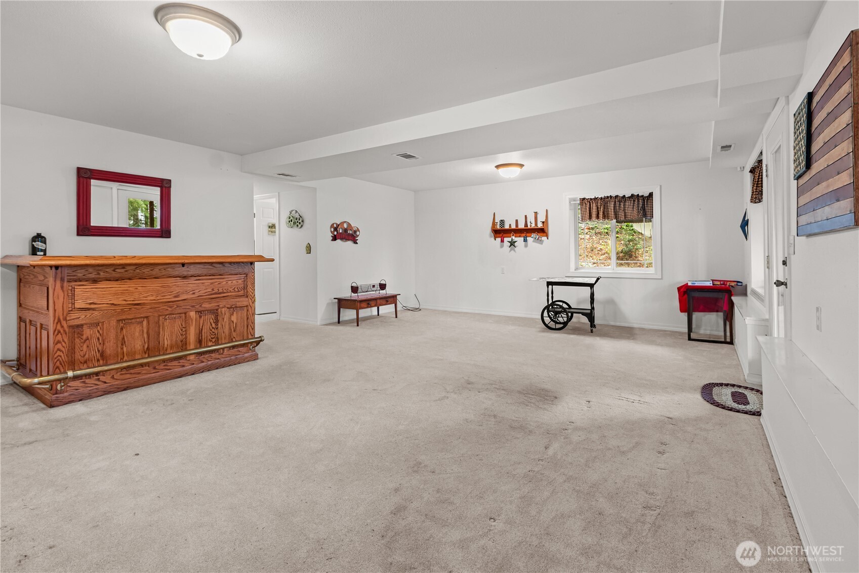 70 Rim View Place Hoodsport, WA 98548 - Photo 20 of 35 a view of a livingroom with furniture and a flat screen tv