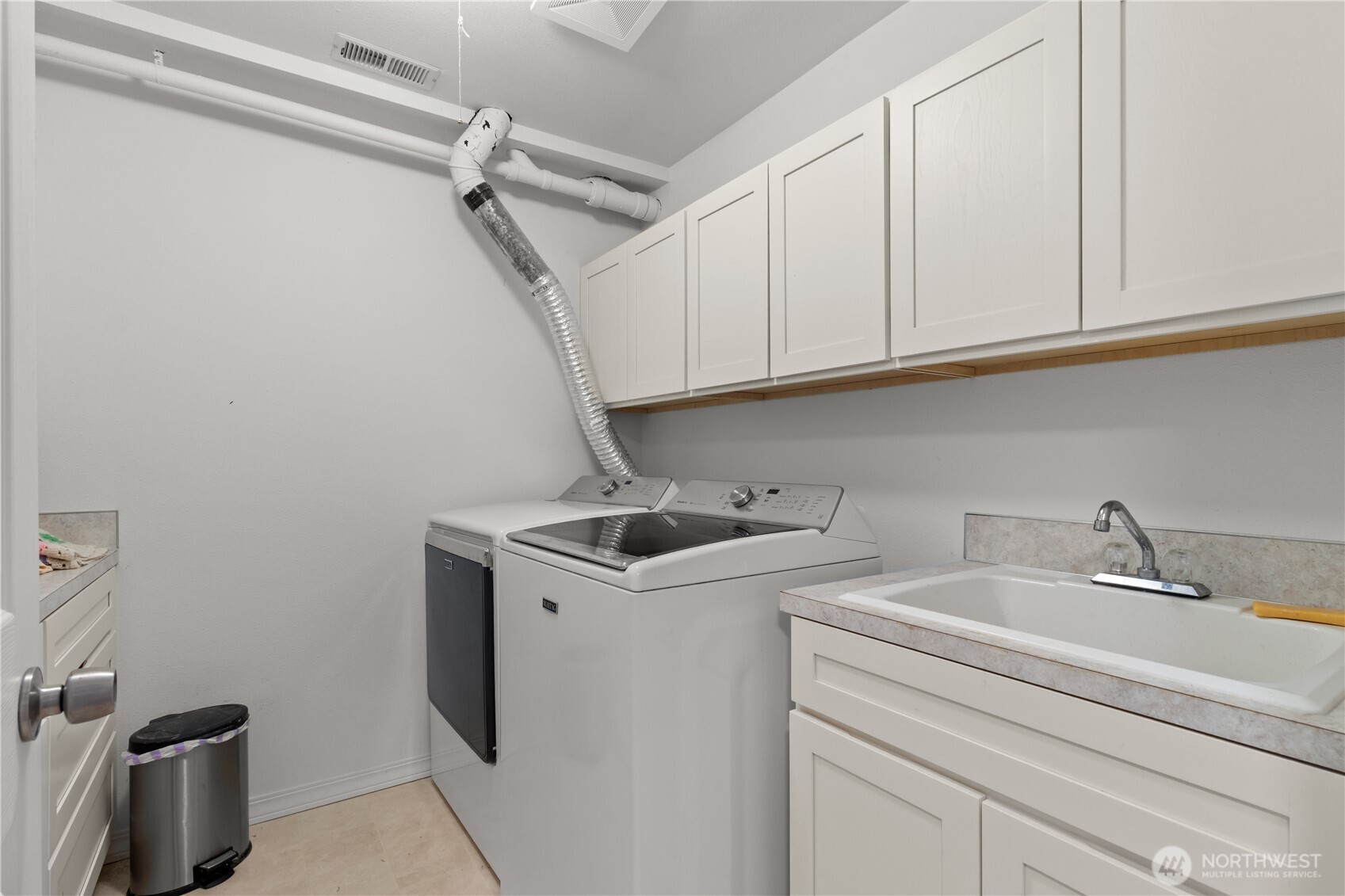 70 Rim View Place Hoodsport, WA 98548 - Photo 23 of 35 a utility room with sink dryer and washer