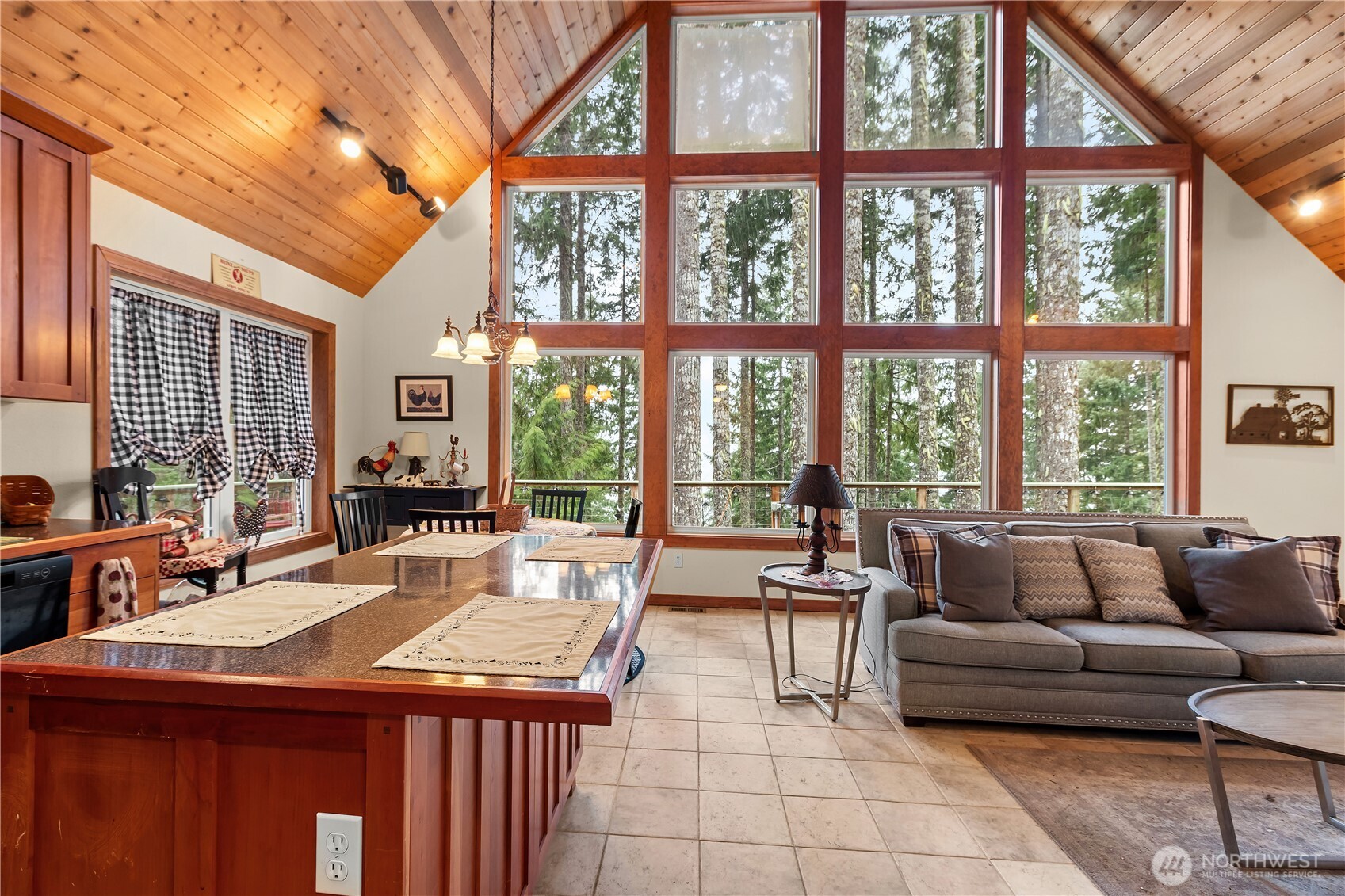 70 Rim View Place Hoodsport, WA 98548 - Photo 4 of 35 a living room with furniture and a large window