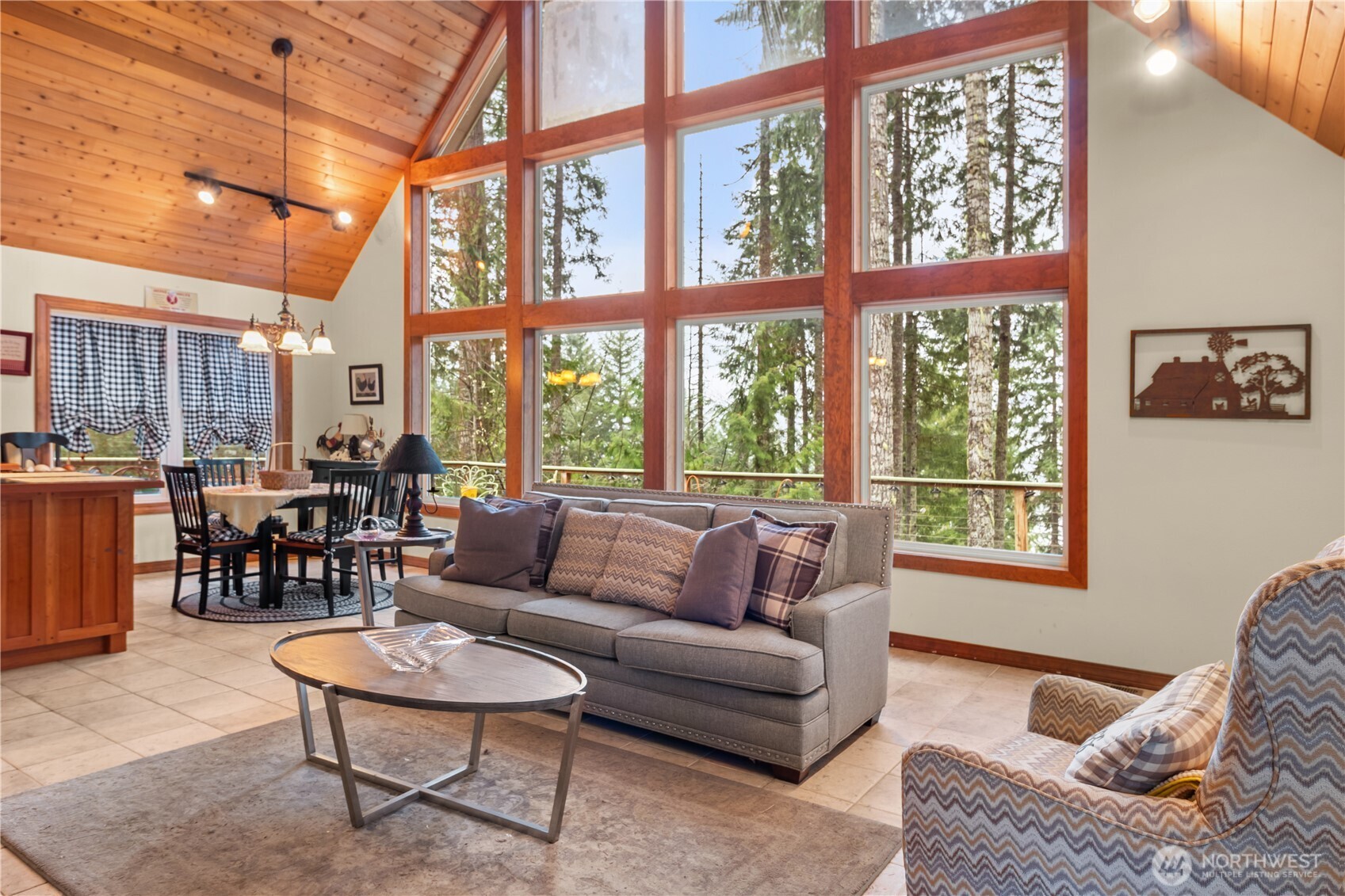 70 Rim View Place Hoodsport, WA 98548 - Photo 5 of 35 a living room with furniture and a large window