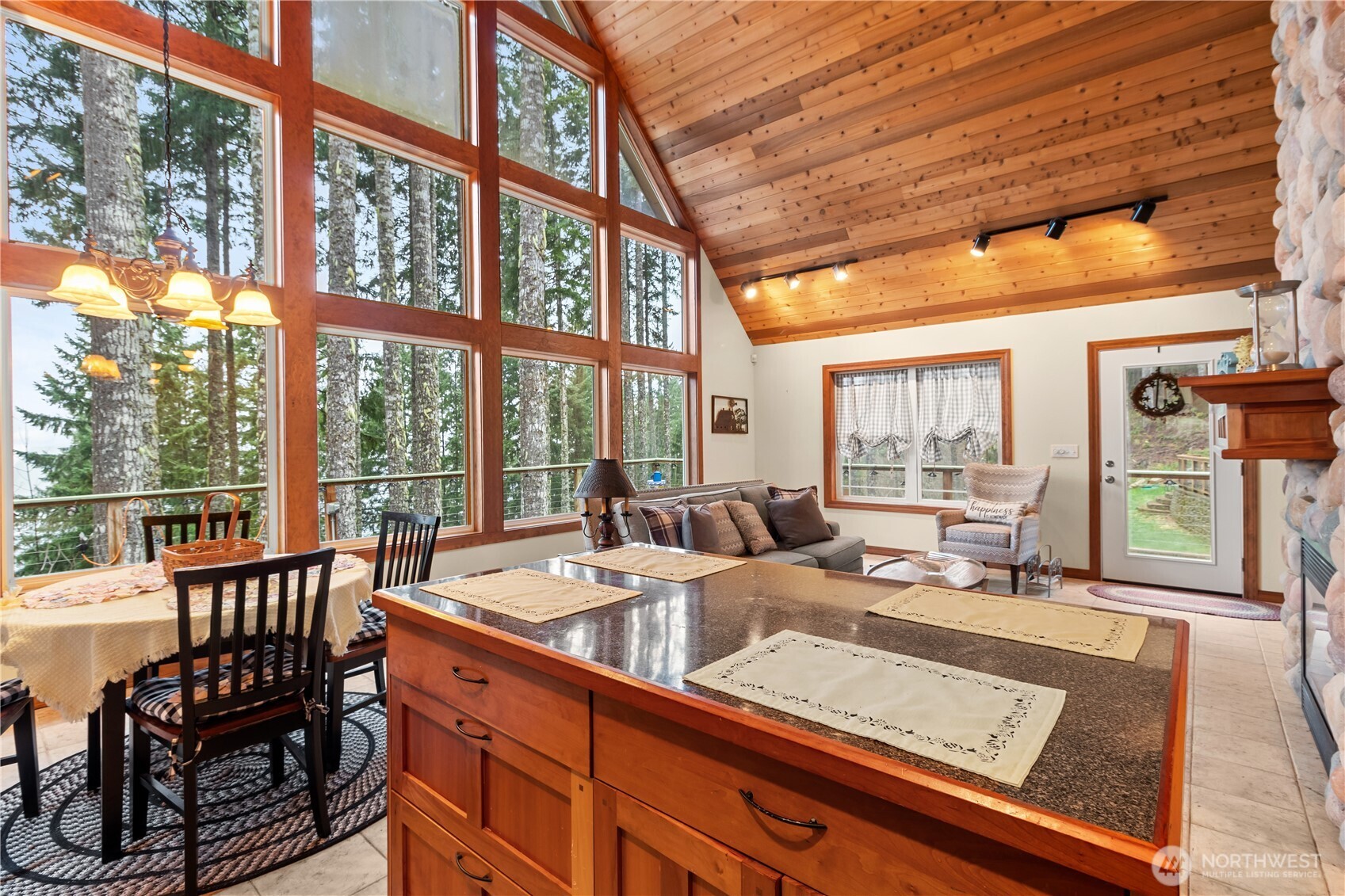 70 Rim View Place Hoodsport, WA 98548 - Photo 7 of 35 a living room with large windows
