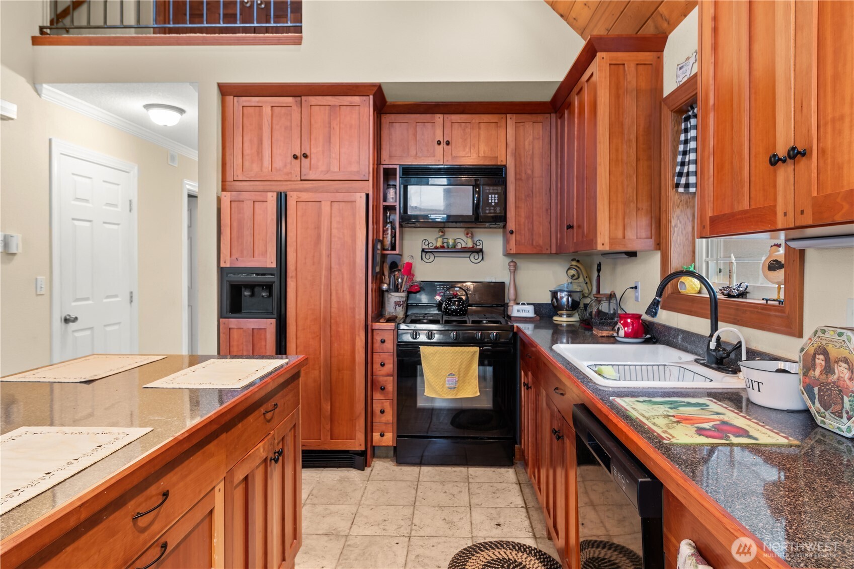 70 Rim View Place Hoodsport, WA 98548 - Photo 8 of 35 a kitchen with stainless steel appliances granite countertop a sink stove and refrigerator