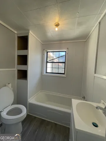 a view of outdoor space and a backyard