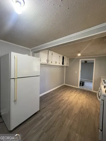 a view of room and a window