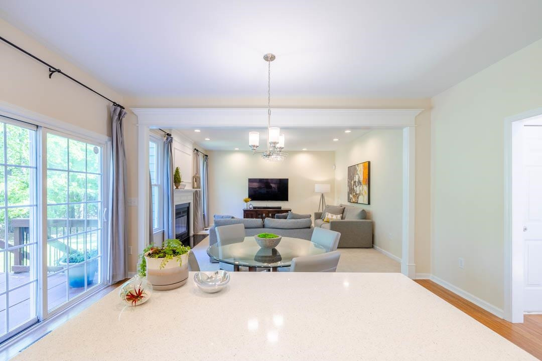 7402 Leapale Lane Durham, NC 27713 - Photo 13 of 41 a living room with furniture and a flat screen tv