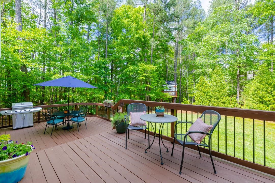 7402 Leapale Lane Durham, NC 27713 - Photo 30 of 41 a view of chairs and table in the balcony