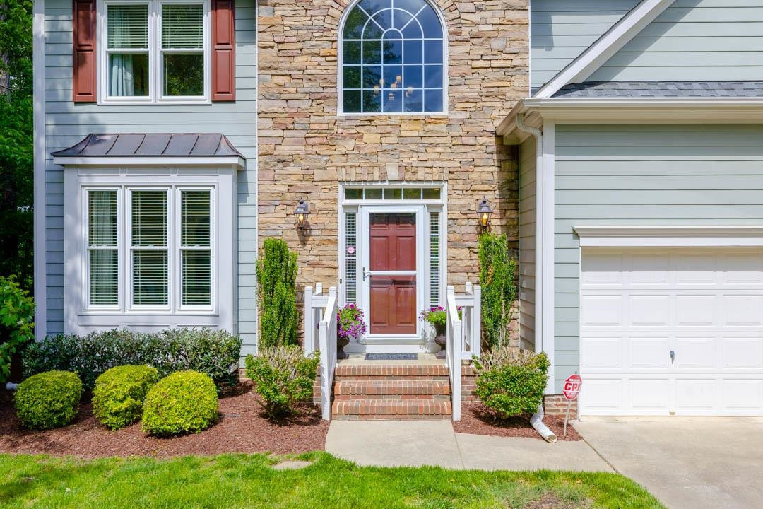 7402 Leapale Lane Durham, NC 27713 - Photo 3 of 41 a front view of a house