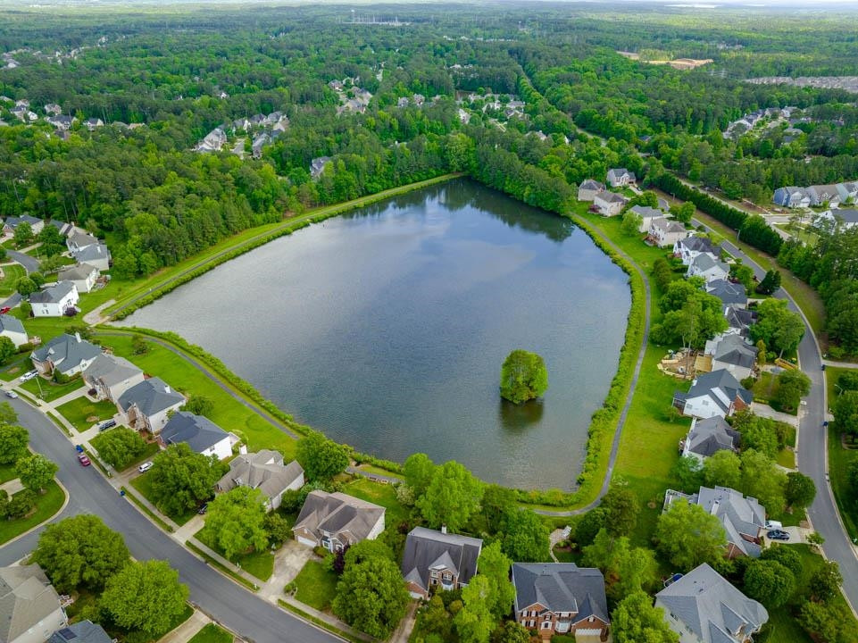 7402 Leapale Lane Durham, NC 27713 - Photo 40 of 41 an aerial view of a golf course with parking space