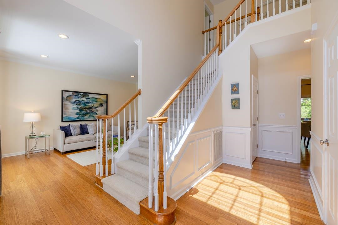 7402 Leapale Lane Durham, NC 27713 - Photo 5 of 41 a view of entryway and hall with wooden floor