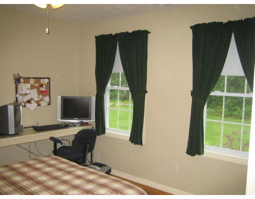 22 A Vinton Road Charlton, MA 01507 - Photo 18 of 24 a workspace with furniture and a flat screen tv