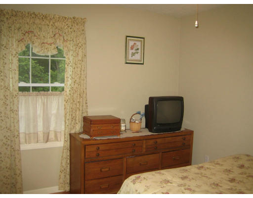 22 A Vinton Road Charlton, MA 01507 - Photo 19 of 24 a room with furniture window and flat screen