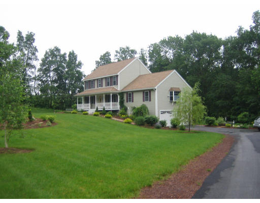 22 A Vinton Road Charlton, MA 01507 - Photo 2 of 24 a aerial view of a house with a yard table and chairs