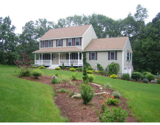 22 A Vinton Road Charlton, MA 01507 - Photo 4 of 24 a aerial view of a house with a yard table and chairs