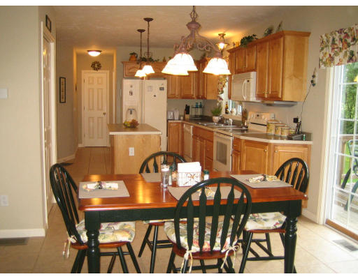 22 A Vinton Road Charlton, MA 01507 - Photo 9 of 24 a view of a dining room and furniture window and wooden floor