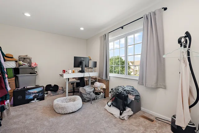 a room with furniture and a window