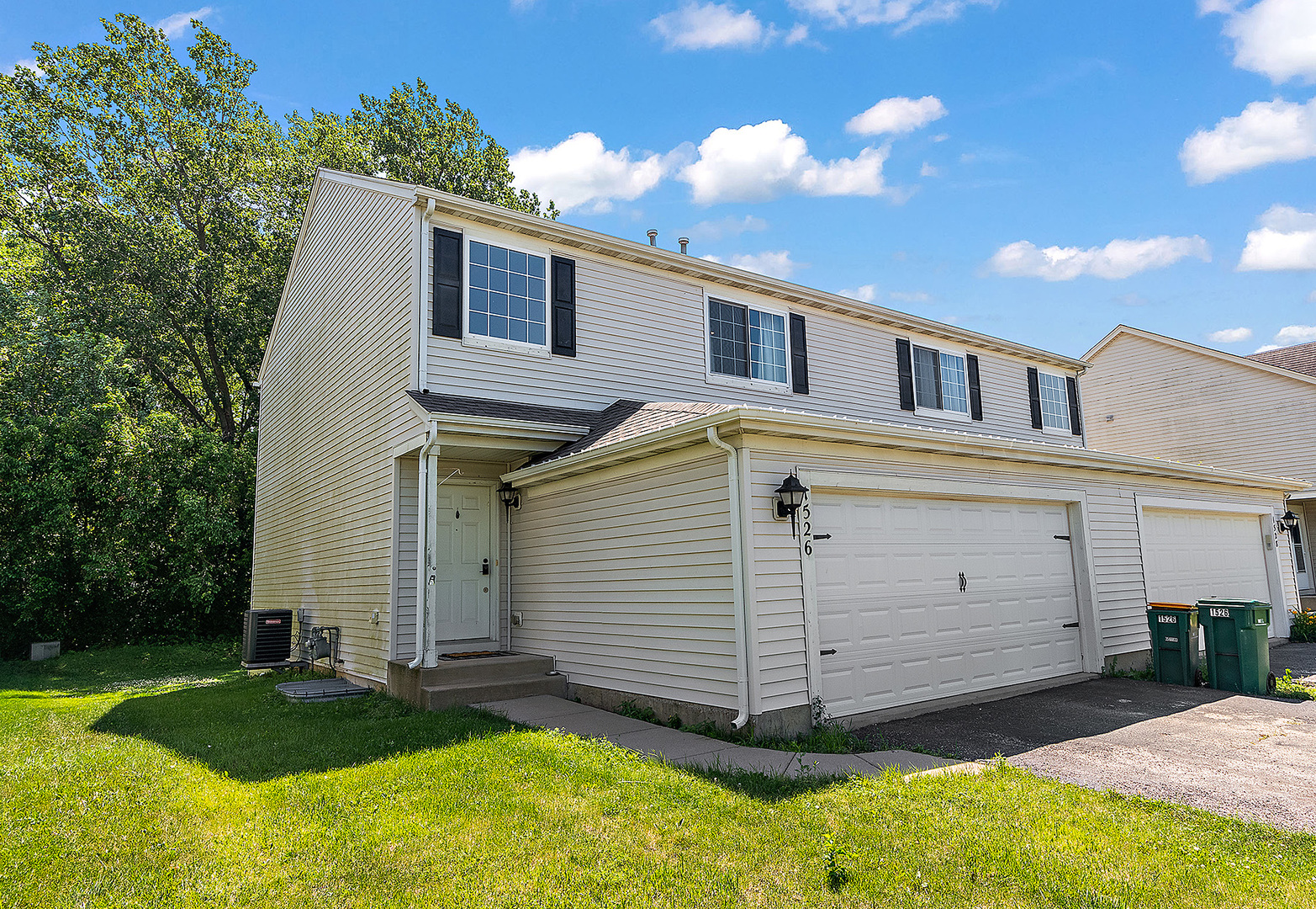 1526 Peachtree Lane Lockport, IL 60441 - Photo 2 of 28 front view of a house with a yard