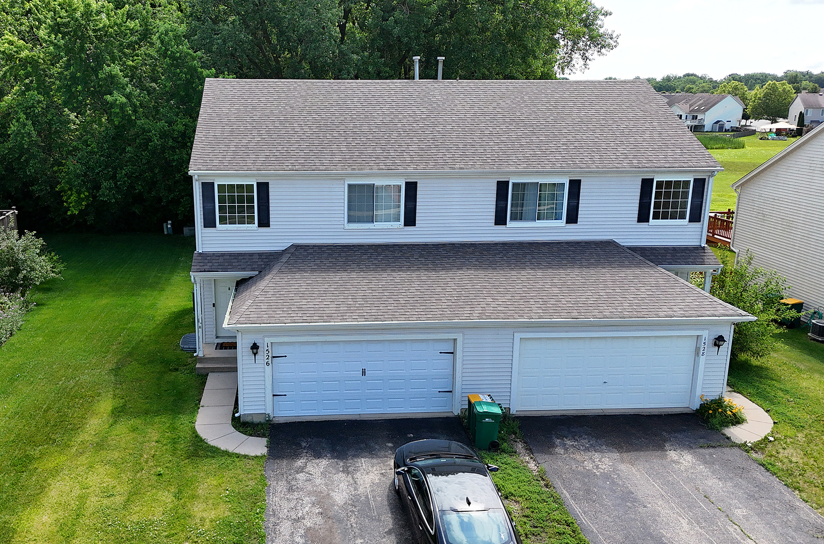 1526 Peachtree Lane Lockport, IL 60441 - Photo 24 of 28 a front view of a house with garden