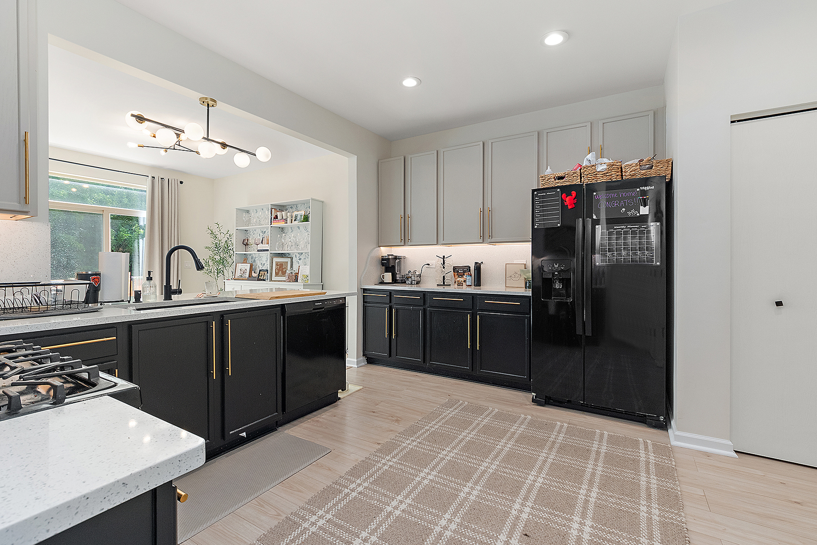 1526 Peachtree Lane Lockport, IL 60441 - Photo 4 of 28 a kitchen with a sink cabinets and stainless steel appliances