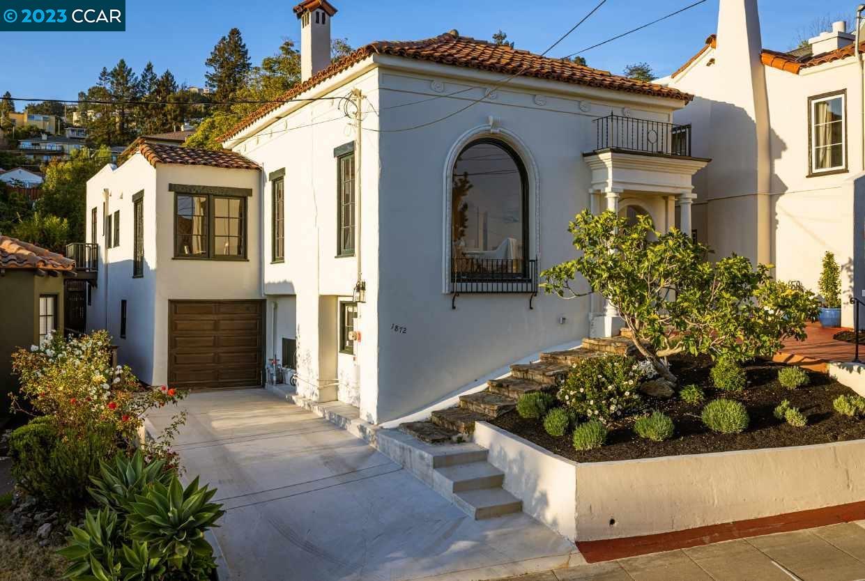 1872 Clemens Road Oakland, CA 94602 - Photo 1 of 1 a front view of a house with a garden