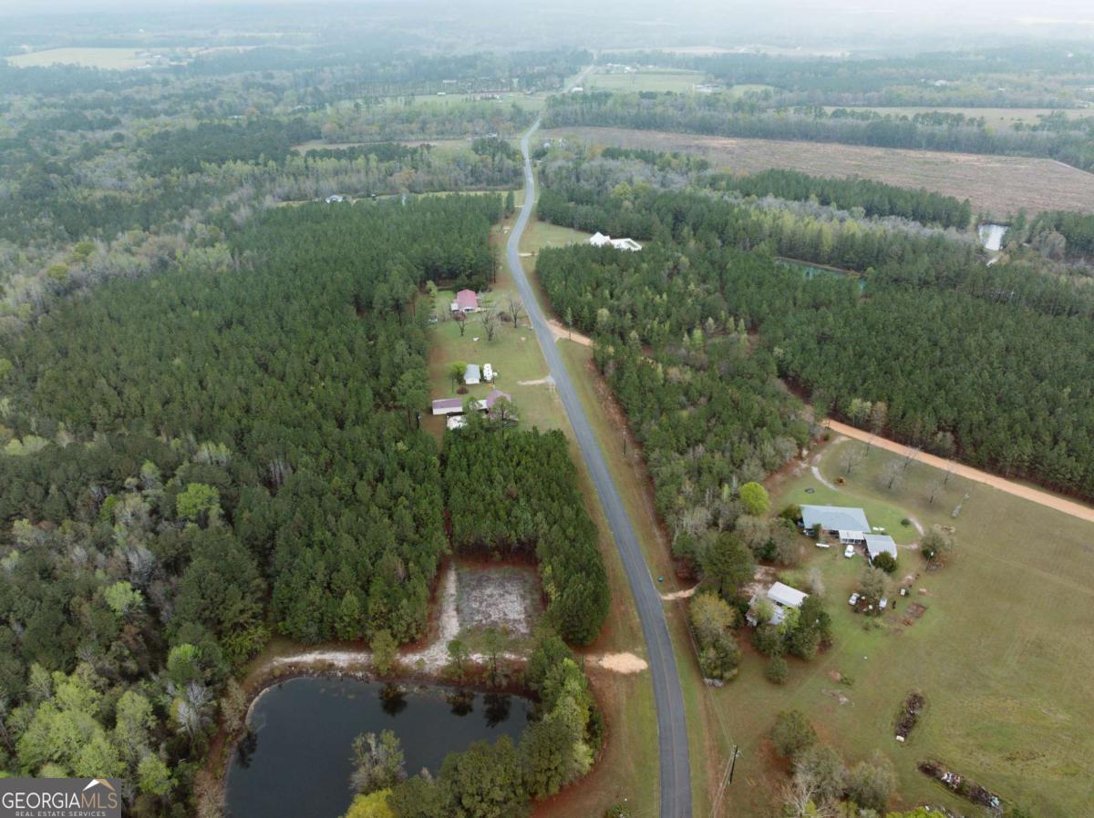 2324 Old Screven Road Jesup, GA 31545 - Photo 12 of 18 an aerial view of a house with a yard