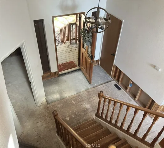 a view of an entryway with a door