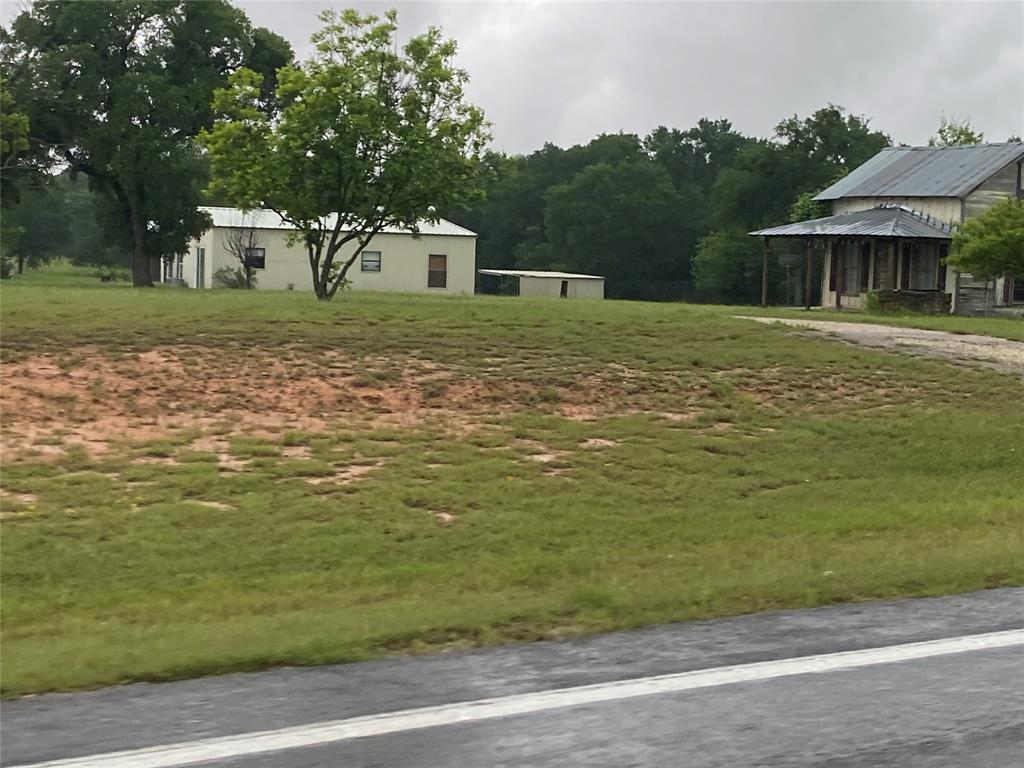 1675 Farm To Market 1713 Morgan, TX 76671 - Photo 7 of 8 a house view with a outdoor space