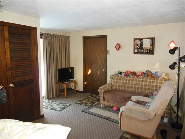446 Amostown Road West Springfield, MA 01089 - Photo 6 of 22 a living room with furniture and a window