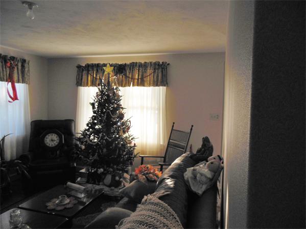 446 Amostown Road West Springfield, MA 01089 - Photo 8 of 22 a living room with furniture and a window