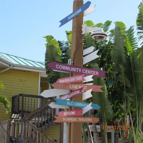 a view of a cafe with sitting area