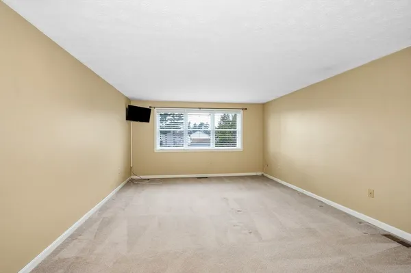 a view of a room with rack on the wall