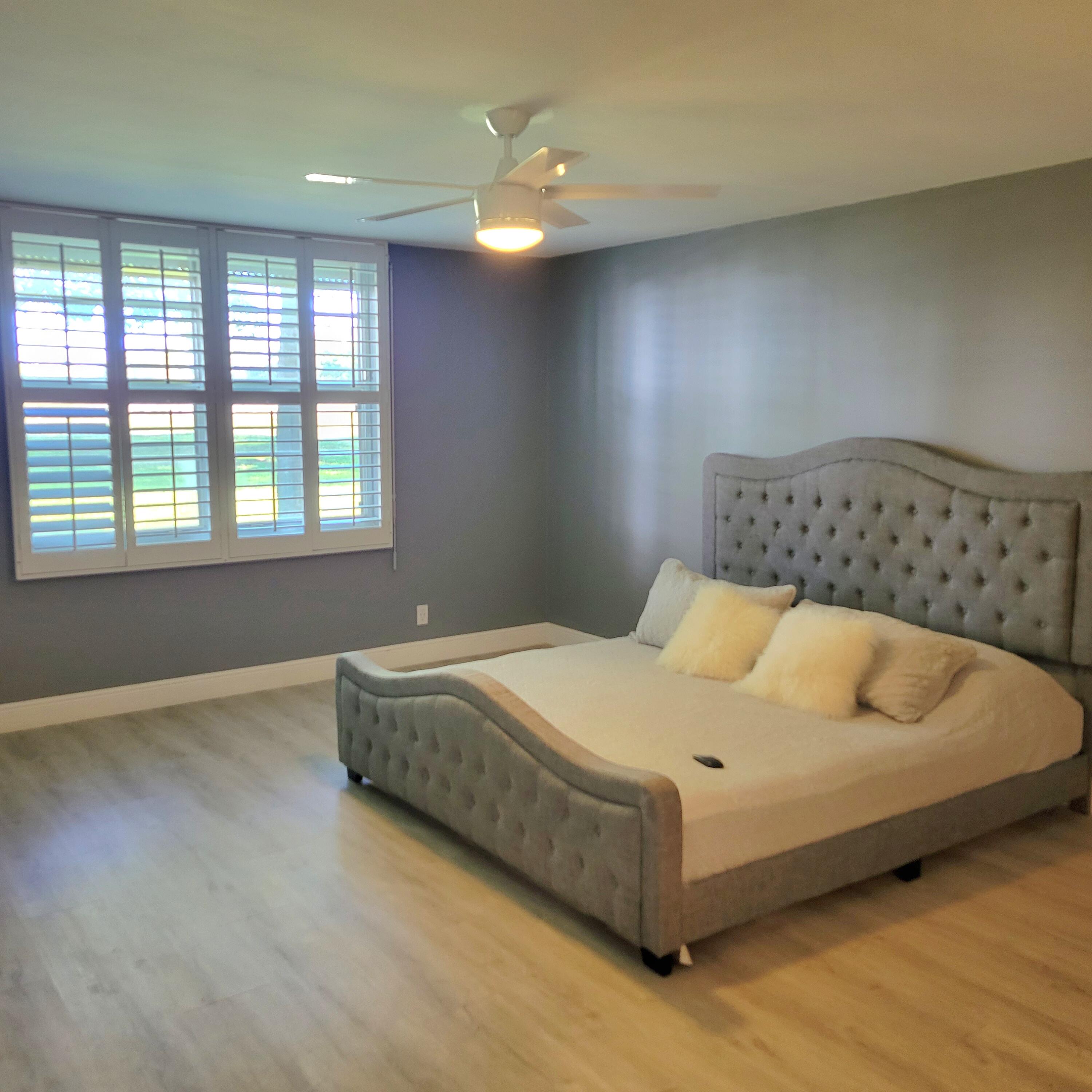 6300 Northwest 2nd Avenue, Unit 101 Boca Raton, FL 33487 - Photo 13 of 34 PRIMARY BEDROOM