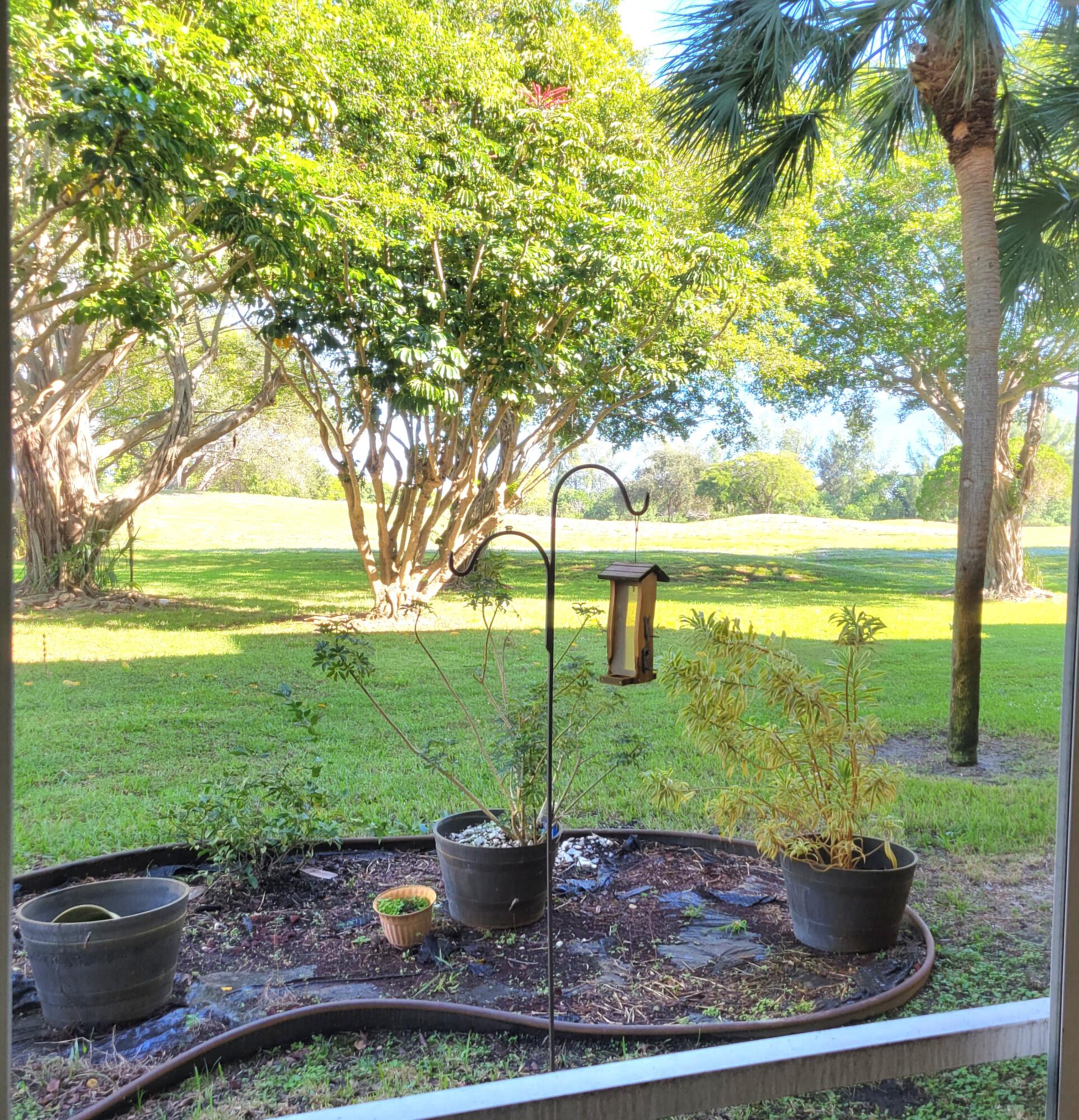6300 Northwest 2nd Avenue, Unit 101 Boca Raton, FL 33487 - Photo 31 of 34 GOLF COURSE/GARDEN VIEW