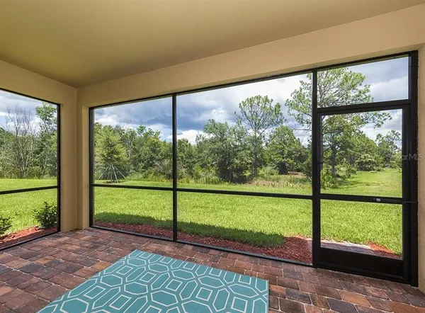a view of a city street from a balcony