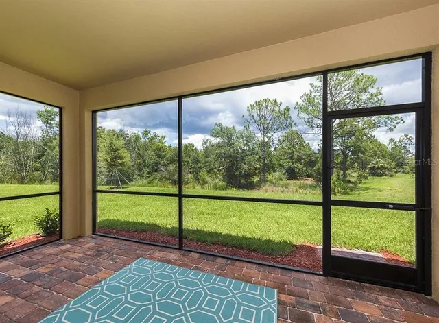 a view of a city street from a balcony